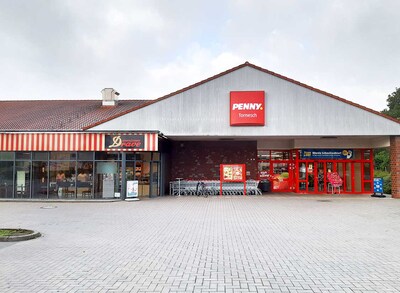 sie sehen den Eingang vom Penny Markt in Tornesch Ohlenhoff 2