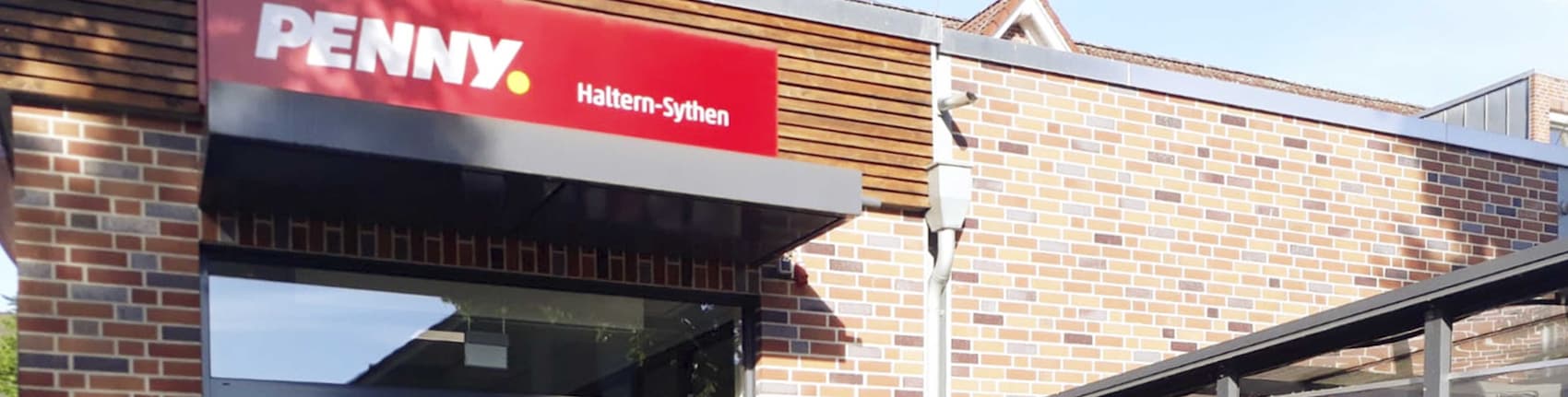 Sie sehen den Eingang vom Penny Markt in Haltern-Sythen, Schalweg 17