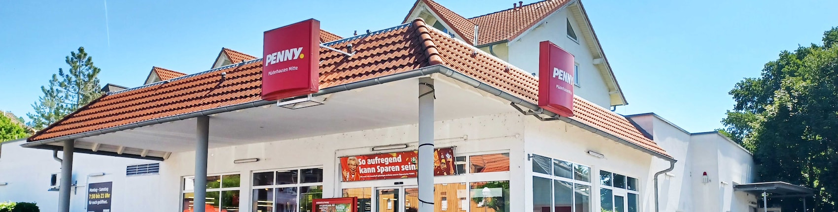 Sie sehen den Eingang vom Penny Markt in Pluederhausen, Obere Kirchgasse 1