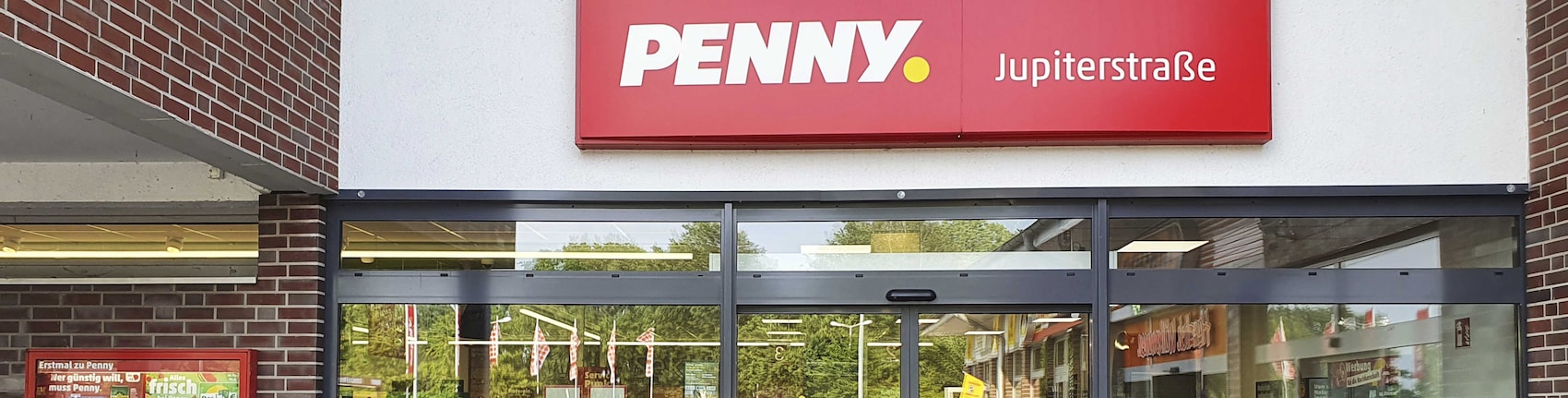 Sie sehen den Eingang vom Penny Markt in Stuhr-Brinkum, Jupiterstraße 2-4