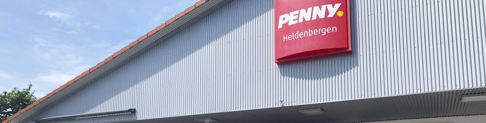 Sie sehen den Eingang vom Penny Markt in Nidderau/Heldenbergen, Buedesheimer Str. 1
