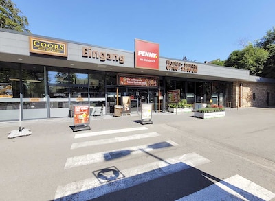 Sie sehen den Eingang vom Penny Markt in Georgsmarienhütte, Im Steinbruch 6