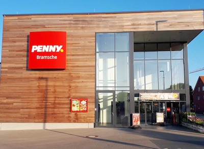Sie sehen den Eingang vom Penny Markt in Bramsche, Engter Straße 24