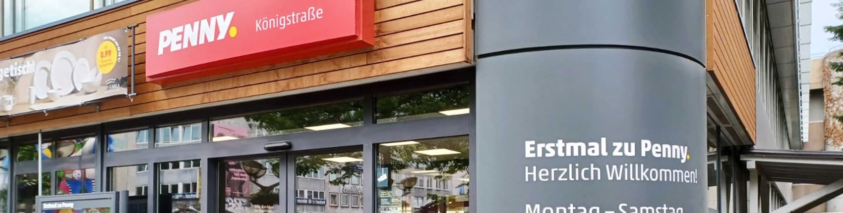 Sie sehen den Eingang vom Penny Markt Duisburg Königstraße 13