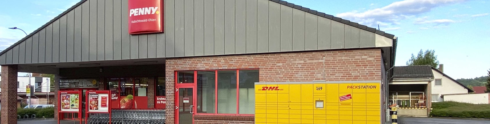 Sie sehen den Eingang vom Penny Markt in Habichtswald, Kasselerstr. 7