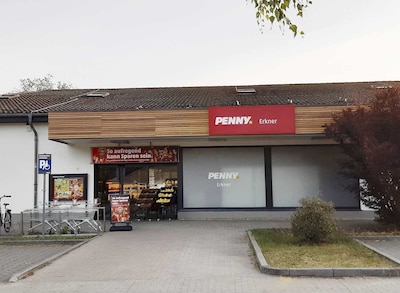 Sie sehen den Eingang vom Penny Markt in Erkner Neuzittauer Str. 41