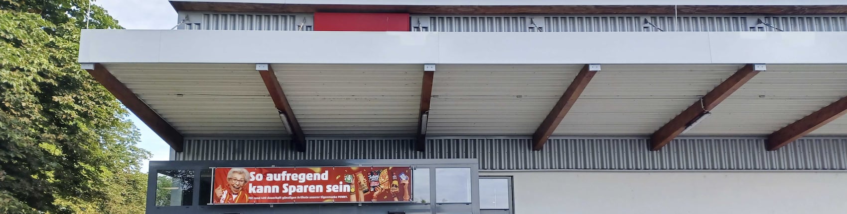 Sie sehen den Eingang vom Penny Markt in Frankenthal, Bender Str. 1