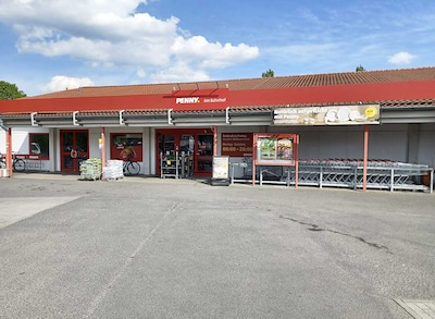 Sie sehen den Eingang vom Penny Markt in Niesky Am Bahnhof 8