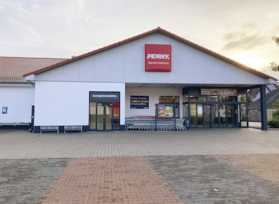 Sie sehen den Eingang vom Penny Markt in Kassel/Niederzwehren, Toepfenhofweg 4