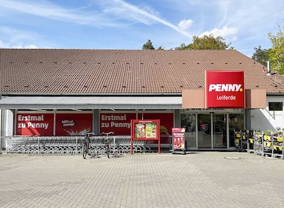 Sie sehen den Eingang vom Penny Markt in Leiferde, Gilder Weg 39