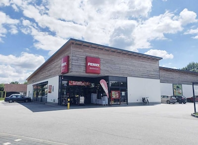 Sie sehen den Eingang vom Penny Markt in Weihmichl, Hauptstraße 37