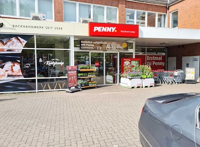 Sie sehen den Eingang vom Penny Markt in Delmenhorst/Dwoberg-Stroehen, Nutzhorner Str. 29