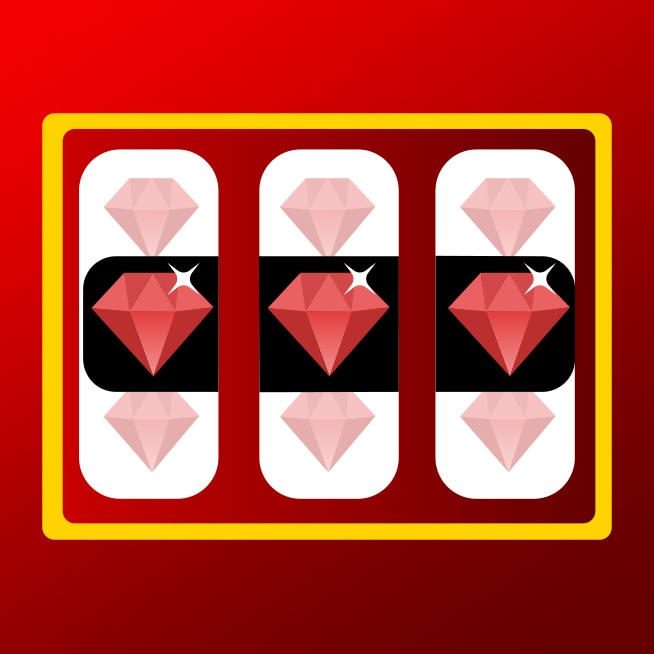 Eine gelbe Münze vor grünem Hintergrund