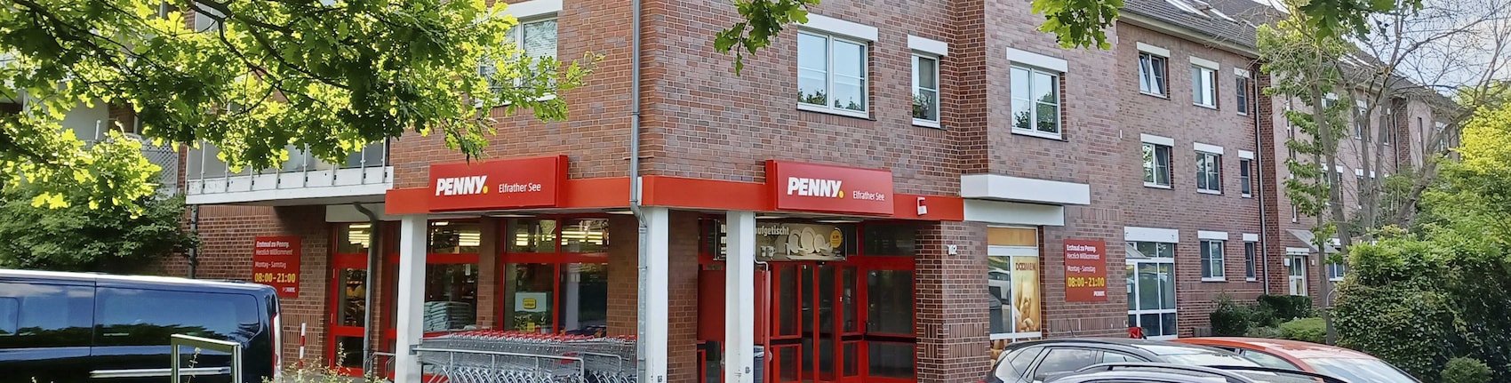 Sie sehen den Eingang vom Penny Markt Krefeld – Gartenstadt Alte Rather Str. 107