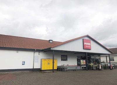Sie sehen den Eingang vom Penny Markt in Oberursel, Pfeiffstrasse 9