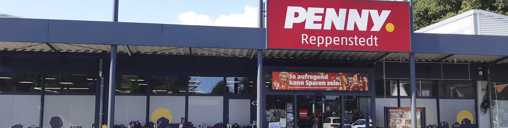 Sie sehen den Eingang vom Penny Markt in Reppenstedt, Lüneburger Landstraße 5