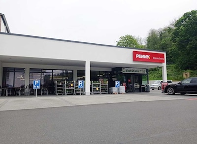 Sie sehen den Eingang vom Penny Markt in Koblenz Arenberger Str. 28