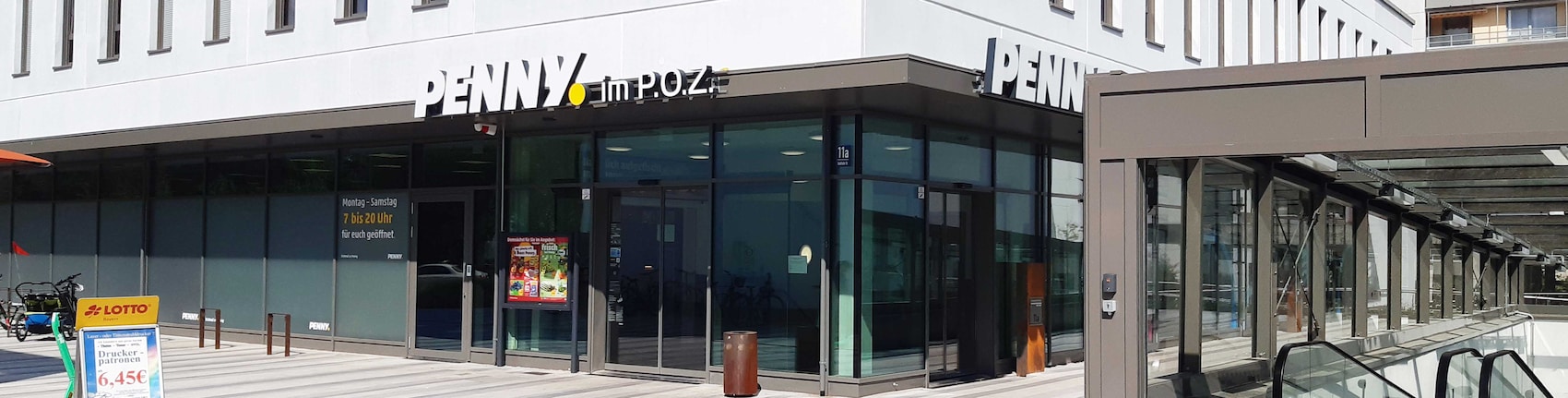 sie sehen den Eingang vom Penny Markt in München Radolfzeller Straße 11 a