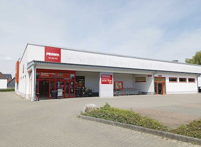 Sie sehen den Eingang vom Penny Markt in Teningen, Hans-Theisen-Str. 18