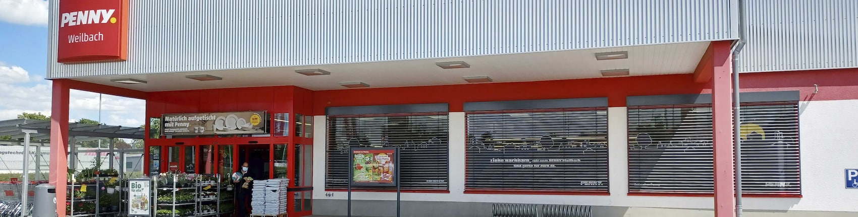 Sie sehen den Eingang vom Penny Markt in Floersheim-Weilbach, Industriestr. 2b