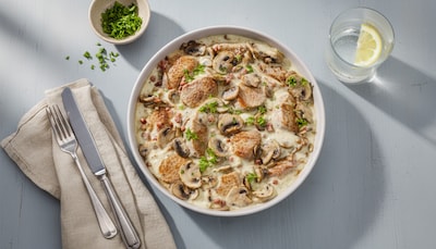 Schweinefilet mit frischen Champignons aus dem Backofen