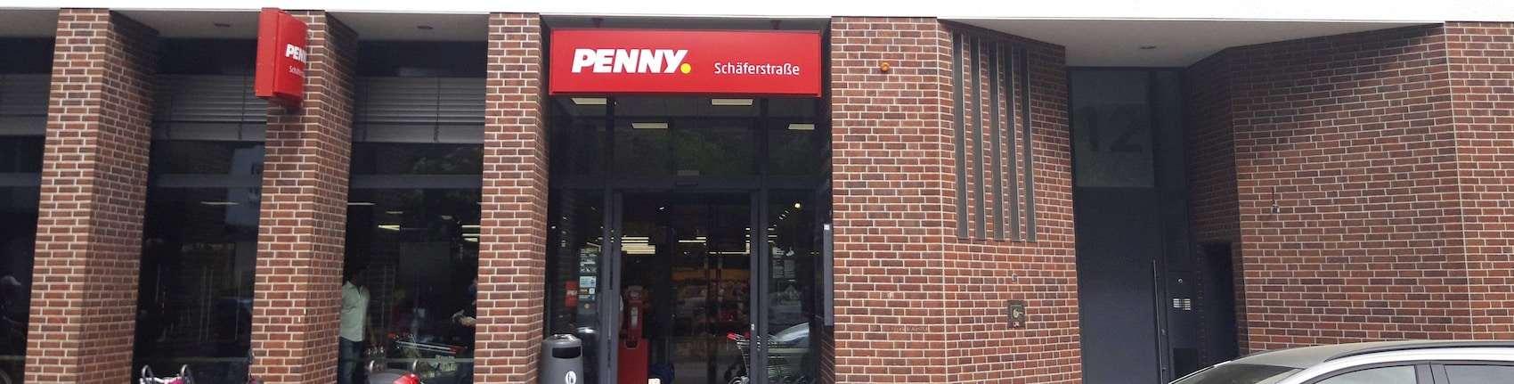 Sie sehen den Eingang vom Penny Markt in Offenbach, Schäferstr. 12