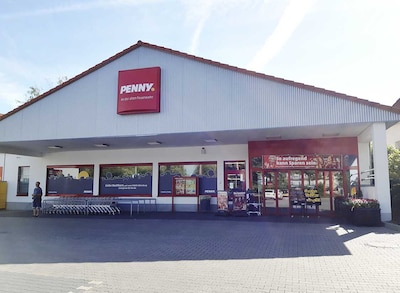 Sie sehen den Eingang vom Penny Markt in Altenburg Muensaer Str. 8