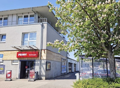sie sehen den Eingang vom Penny Markt in Dormagen Wilhelm-Zaun-Str. 64