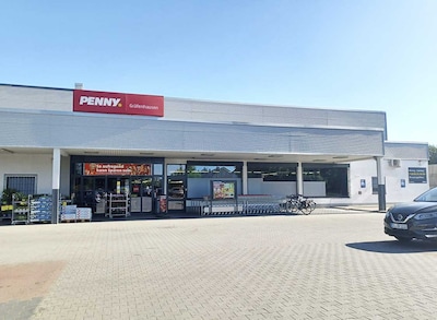 Sie sehen den Eingang vom Penny Markt in Weiterstadt-Gräfenhausen, Schneppenhäuser Str. 21a