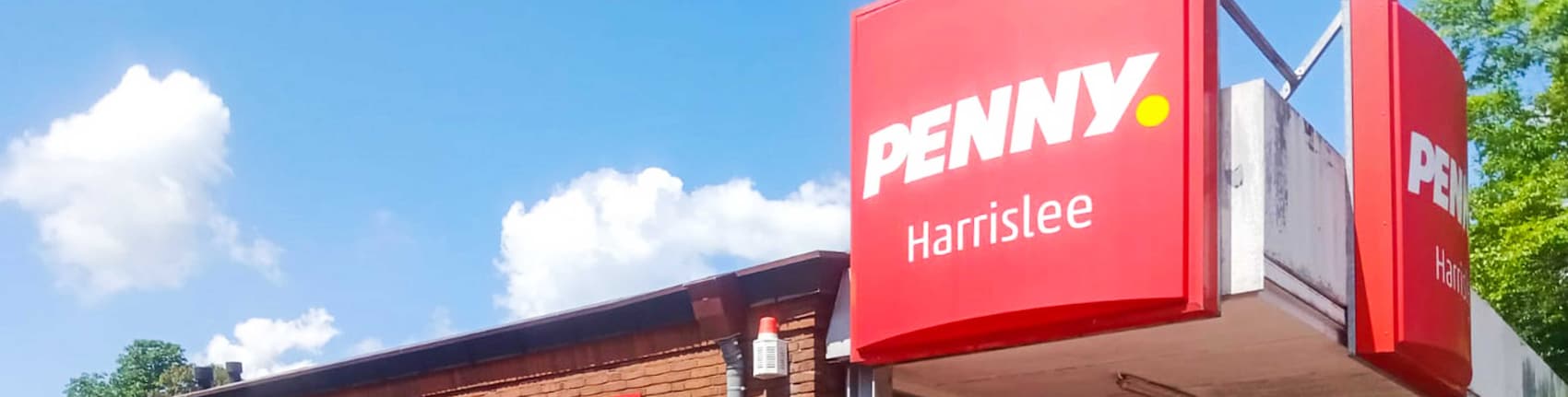 Sie sehen den Eingang vom Penny Markt in Harrislee Musbeker Weg 1