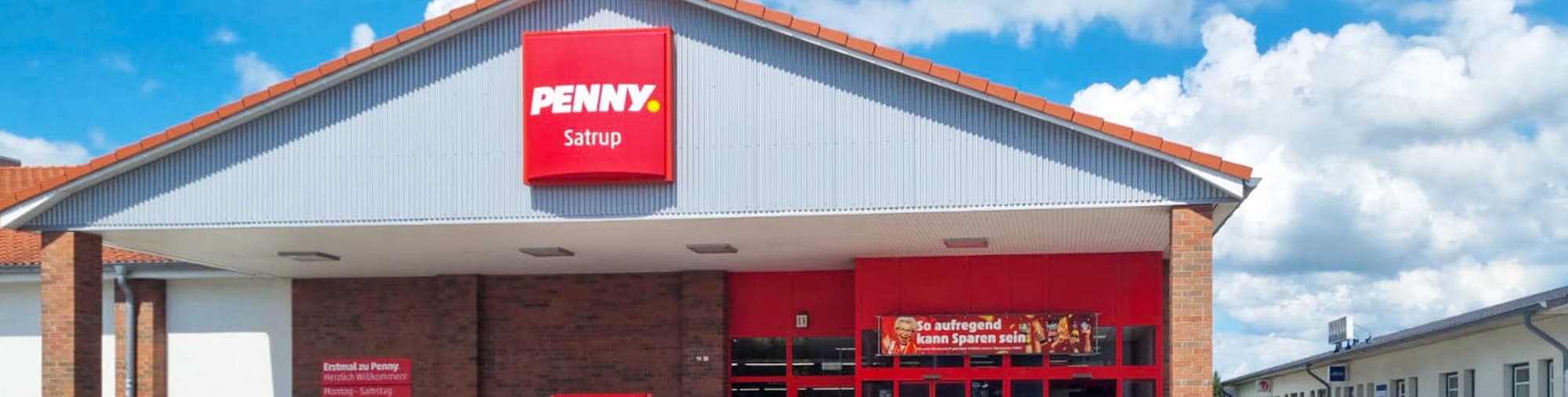 sie sehen den Eingang vom Penny Markt in Satrup Mühlenstraße 14