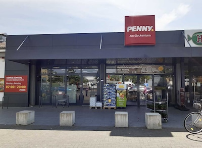 Sie sehen den Eingang vom Penny Markt in Mainaschaff Am Glockenturm 9