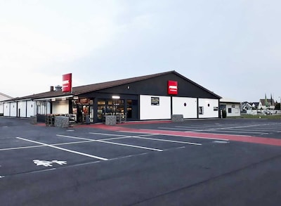Sie sehen den Eingang vom Penny Markt in Eimeldingen, Im Rebacker 3