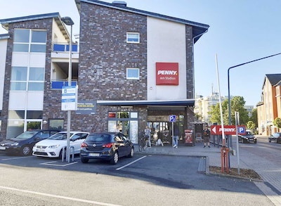 Sie sehen den Eingang vom Penny Markt Ratingen – Zentrum Stadionring 4