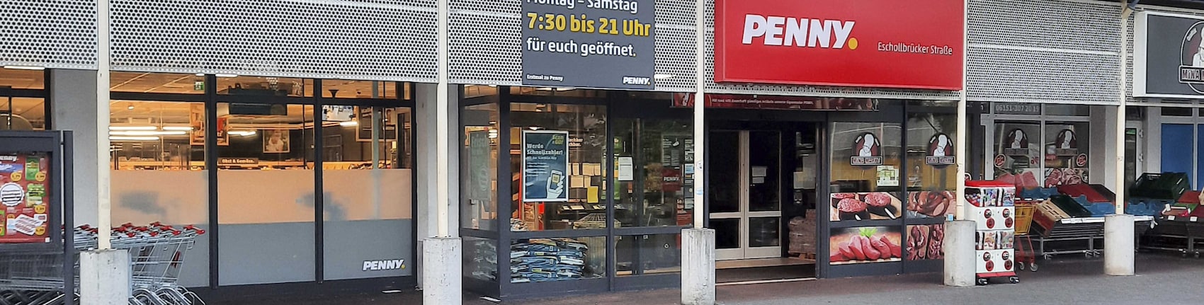 Sie sehen den Eingang vom Penny Markt in Darmstadt, Eschollbruecker Str. 26