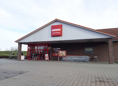 Sie sehen den Eingang vom Penny Markt in Wischhafen, Ziegelstrasse 15