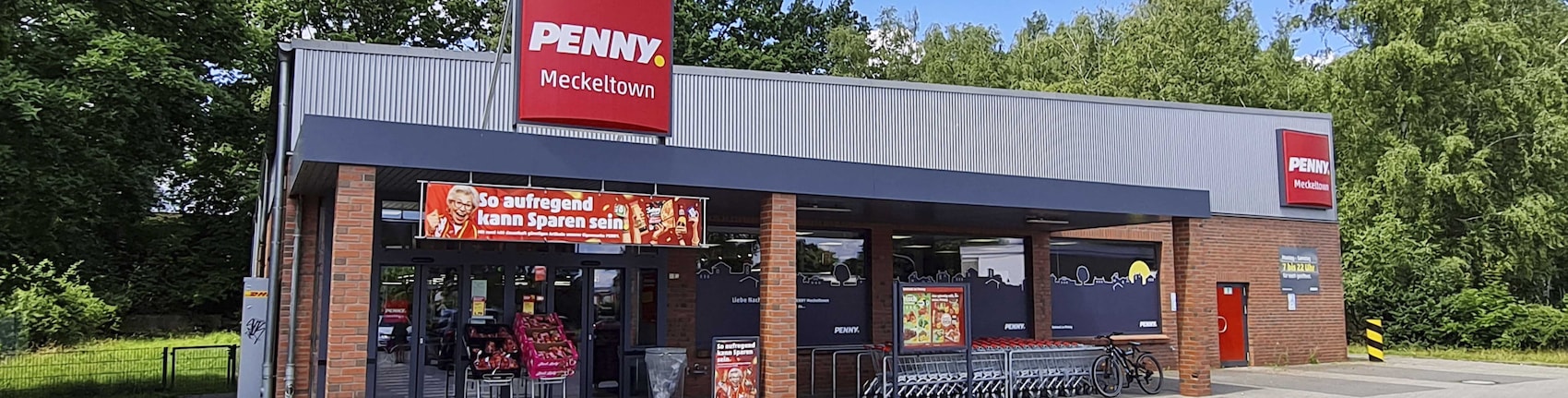 Sie sehen den Eingang vom Penny Markt in Seevetal/Meckelfeld, Gluesinger Str. 32