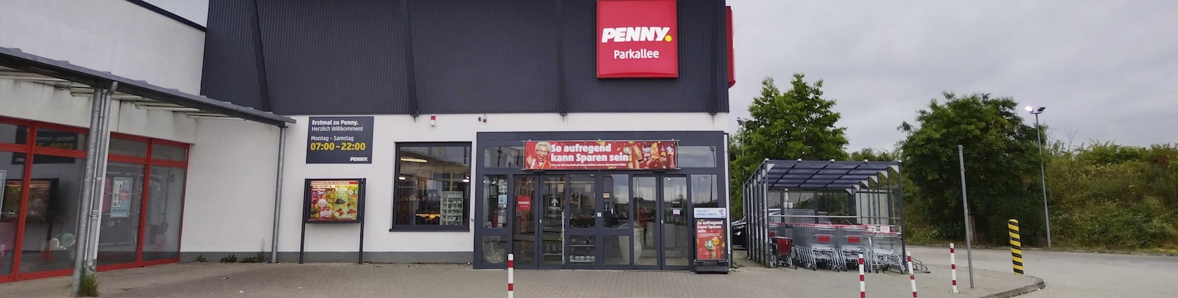 Sie sehen den Eingang vom Penny Markt in Weilerswist Parkallee 18 