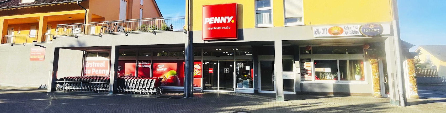 Sie sehen den Eingang vom Penny Markt in Grenzach-Wyhlen, Rheinfelder Str. 34
