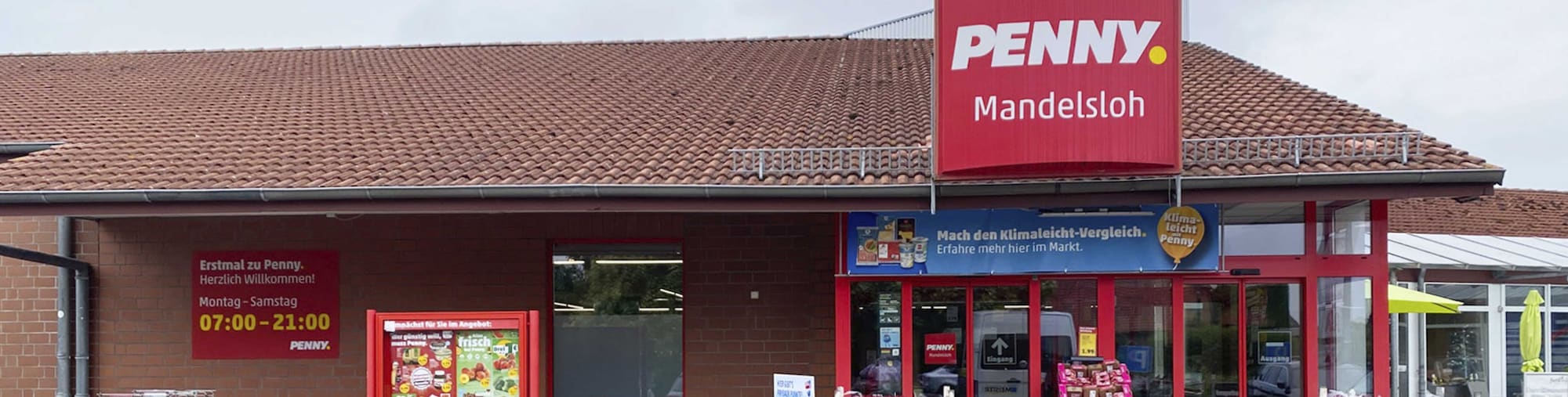 Sie sehen den Eingang vom Penny Markt in Mandelsloh, Amedorfer Str. 31