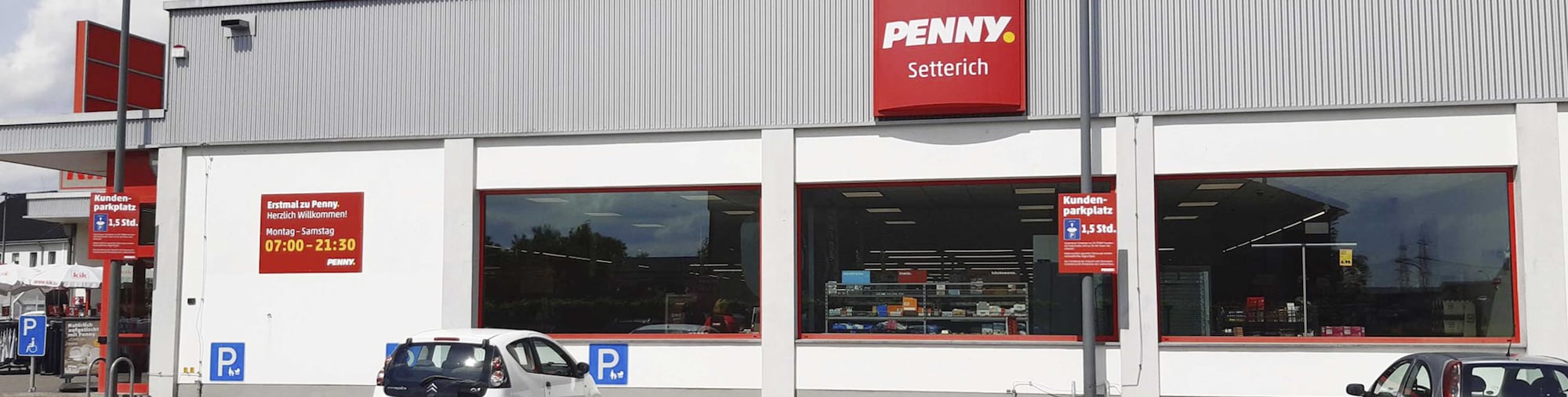 Sie sehen den Eingang vom Penny Markt Baesweiler – Setterich Hauptstr. 124-126 