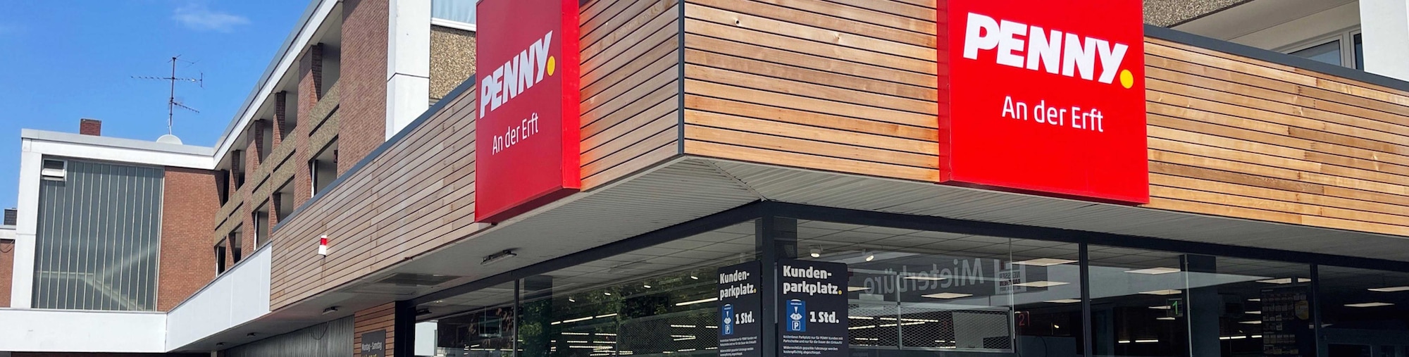 sie sehen den Eingang vom Penny Markt in Neuss – Erfttal Euskirchener Strasse 7-11