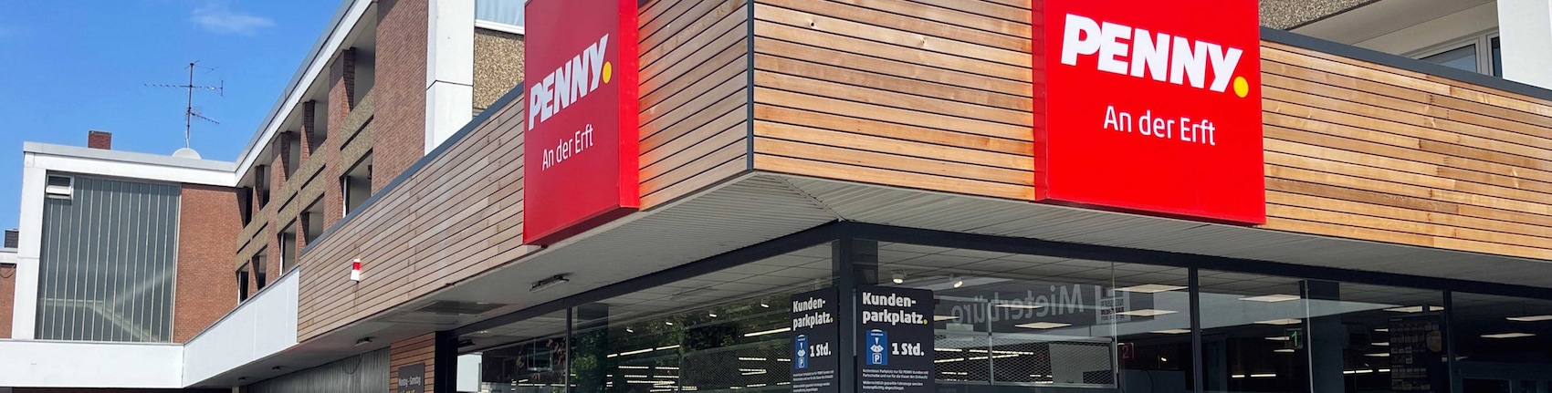 sie sehen den Eingang vom Penny Markt in Neuss – Erfttal Euskirchener Strasse 7-11