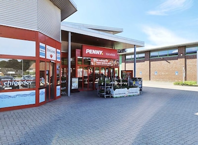 Sie sehen den Eingang vom Penny Markt in Harsefeld, Am Bahnhof Sued 7