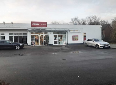 Sie sehen den Eingang vom Penny Markt in Porta Westfalica, Ellernstr. 1
