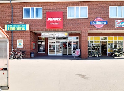 sie sehen den Eingang vom Penny Markt in Malchow Rostocker Str. 7A