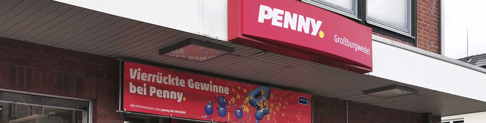 Sie sehen den Eingang vom Penny Markt in Grossburgwedel, Hannoversche Str. 1