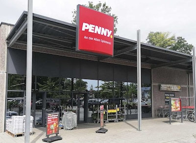 Sie sehen den Eingang vom Penny Markt in Kolbermoor An Der Alten Spinnerei 12
