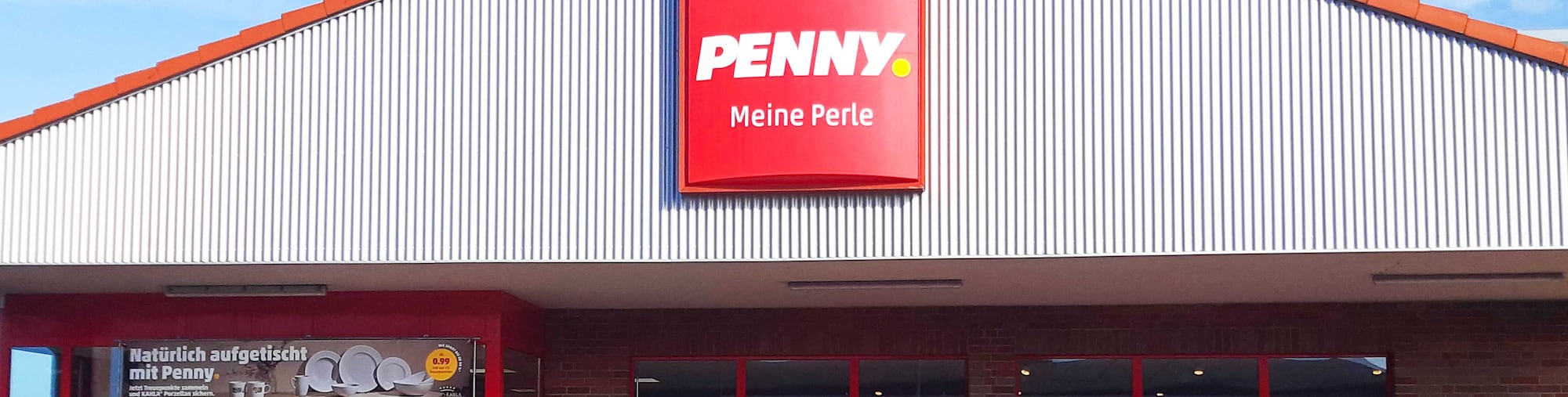 Sie sehen den Eingang vom Penny Markt in Husum Siemensstr. 47-49