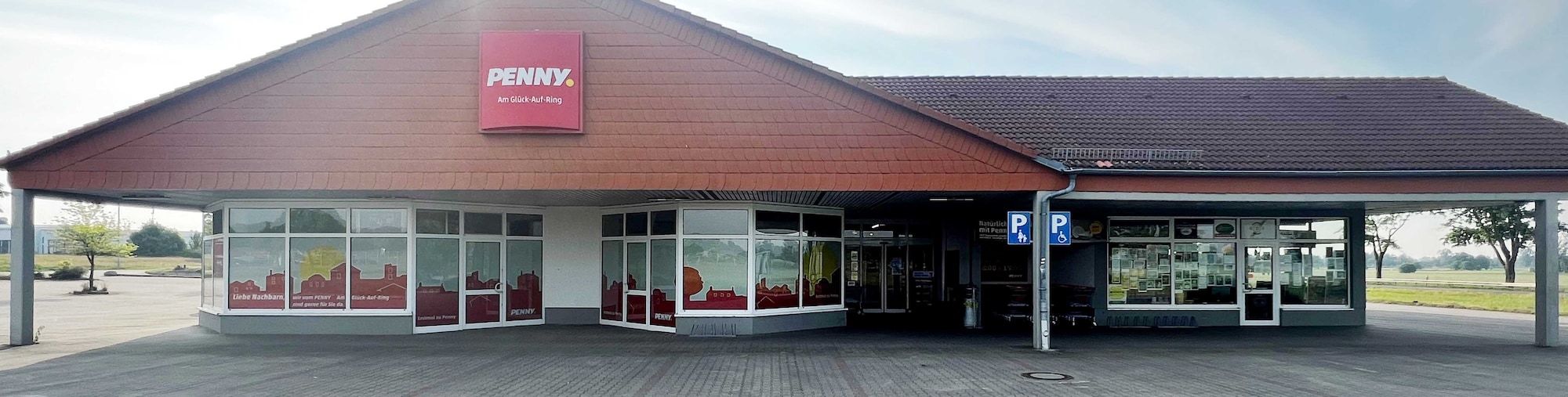 Sie sehen den Eingang vom Penny Markt in Plessa Glueck-Auf-Ring 3